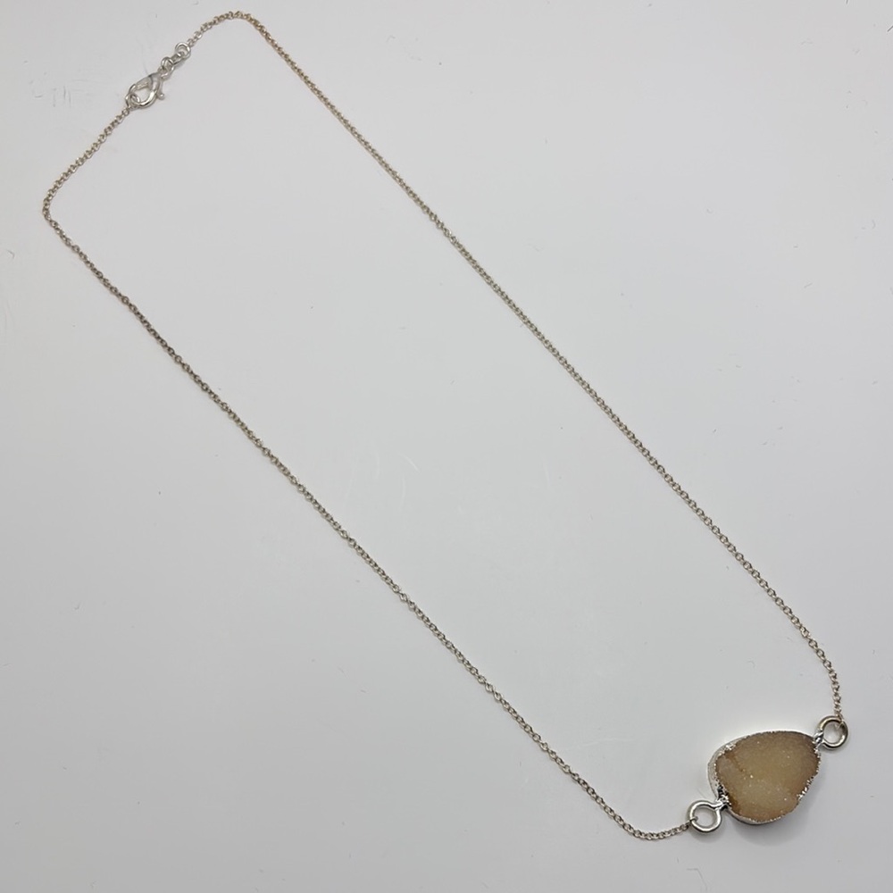 Elegant Silver and Gold Pendant Necklace